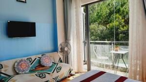TV a/nebo společenská místnost v ubytování NEST House