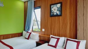 Postel nebo postele na pokoji v ubytování NEST House