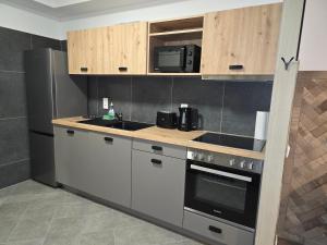 Kuchyň nebo kuchyňský kout v ubytování Aparthotel Fairschlafen Minden + 37 fotografií