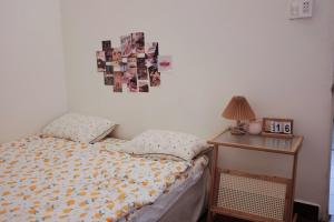 Ένα ή περισσότερα κρεβάτια σε δωμάτιο στο Xanh House XVNT