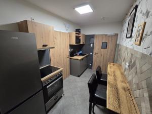 Kuchyň nebo kuchyňský kout v ubytování Aparthotel Fairschlafen Minden