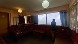 Posezení v ubytování Radiance Art Residency Poombarai Kodaikanal