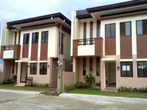 a large building with a street in front of it at Momently in Lapu Lapu City