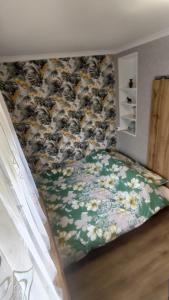 Ένα ή περισσότερα κρεβάτια σε δωμάτιο στο Miętówka