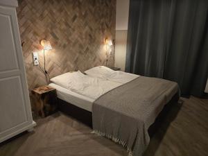 Postel nebo postele na pokoji v ubytování Aparthotel Fairschlafen Minden