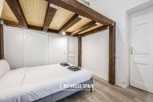 Ein Bett oder Betten in einem Zimmer der Unterkunft MyHouseSpain - Great apartment 6 PAX MADRID CITY CENTER