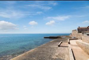 a view of the ocean from a building at NOVIGRAD Ema 2 in Novigrad Istria