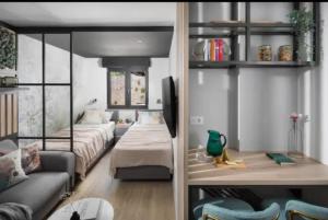 a living room with a bed and a couch at NOVIGRAD Ema 2 in Novigrad Istria