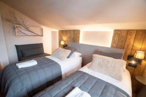 Giường trong phòng chung tại Borda Conangle Mountain Lodge