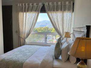 Postel nebo postele na pokoji v ubytování Sintra Hotel + 37 fotografií