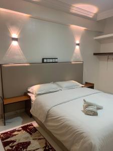 Postel nebo postele na pokoji v ubytování Hôtel Moukawama Restaurant & SPA Dakhla
