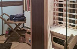 a room with a desk and a chair and a window at Ferienhaus Mit Sauna in Fohnsdorf