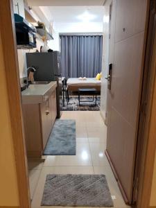 Kuchyň nebo kuchyňský kout v ubytování 642 - Quiet & secured condo in Cavite with HI speed WIFI