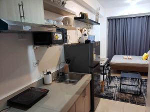 Kuchyň nebo kuchyňský kout v ubytování 642 - Quiet & secured condo in Cavite with HI speed WIFI