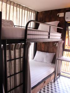 Postel nebo postele na pokoji v ubytování Rom Casa Hostel Da Nang