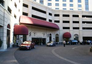 a building with cars parked in a parking lot at Suites at Marriott's Grand Chateau Las Vegas-No Resort Fee in Las Vegas