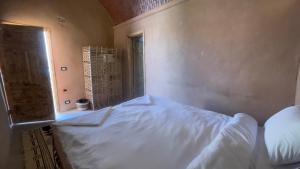 Letto o letti in una camera di Massel Belosso