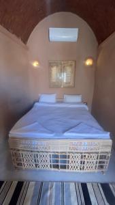 Letto o letti in una camera di Massel Belosso