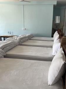 Postelja oz. postelje v sobi nastanitve Sauraha Guest House