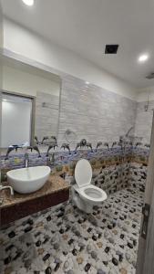 Koupelna v ubytování Hotel Akshaya