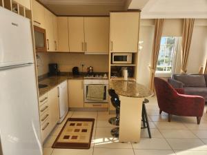 A kitchen or kitchenette at Antalya belek 4 nirvana club first floor two bedrooms pool view with water slide close to center - belek beach park