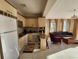 A kitchen or kitchenette at Antalya belek 4 nirvana club first floor two bedrooms pool view with water slide close to center - belek beach park