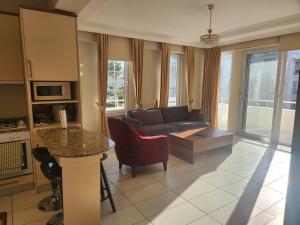 A kitchen or kitchenette at Antalya belek 4 nirvana club first floor two bedrooms pool view with water slide close to center - belek beach park