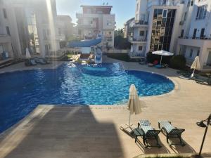 The swimming pool at or close to Antalya belek 4 nirvana club first floor two bedrooms pool view with water slide close to center - belek beach park