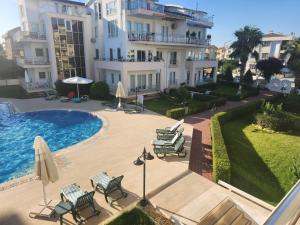 The swimming pool at or close to Antalya belek 4 nirvana club first floor two bedrooms pool view with water slide close to center - belek beach park