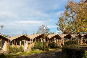 a row of cottages in a resort at hu Roma Camping In Town in Rome