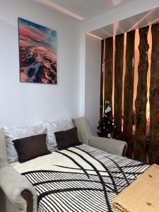 Ένα ή περισσότερα κρεβάτια σε δωμάτιο στο Apartman Vučko