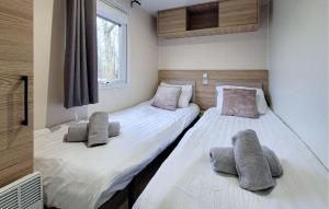 Cama o camas de una habitación en Chalet Lauwersoog