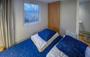 Cama ou camas em um quarto em Amazing StaCaravan In Lauwersoog