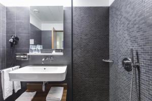 Koupelna v ubytování Hotel de Guimaraes Business & SPA