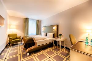 Postel nebo postele na pokoji v ubytování Hotel SchreiberHof