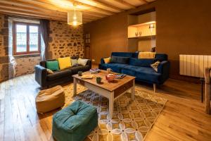 Predel za sedenje v nastanitvi Gîte Chez Pyero