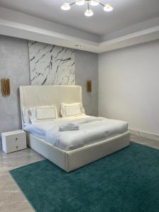 Katil atau katil-katil dalam bilik di Sujimoto Residences MacDonald