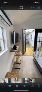 a view of a room with a bed and a window at Charming Coastal Retreat in Miami +2 photos
