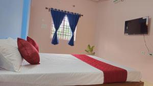 Postel nebo postele na pokoji v ubytování Pondy Pleasant Stay
