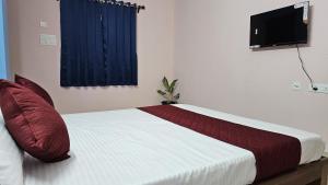 Postel nebo postele na pokoji v ubytování Pondy Pleasant Stay