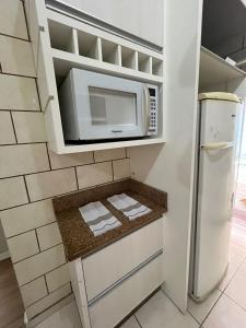 Køkken eller tekøkken på Casa em condomínio + 31 billeder