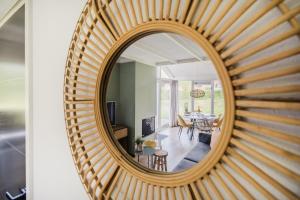 Posezení v ubytování Braamsluiper I Vakantiehuis met Uitzicht op Ruime Tuin