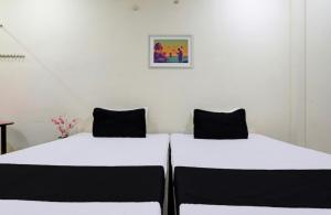 Voodi või voodid majutusasutuse Hotel Suryawanshi toas