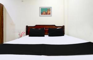 Postel nebo postele na pokoji v ubytování Hotel Suryawanshi + 10 fotografií