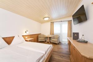 Sjónvarps- og/eða afþreyingartæki á Hotel Vorderronach