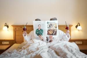 Postel nebo postele na pokoji v ubytování Hotel Vorderronach