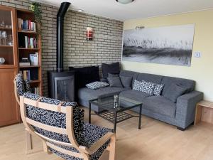 Ruang duduk di Holiday home with outdoor lounging