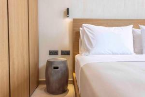 Postel nebo postele na pokoji v ubytování Pnoes Luxury Suites