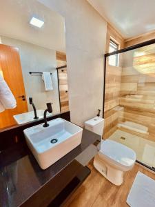 Koupelna v ubytování Hit Hotel