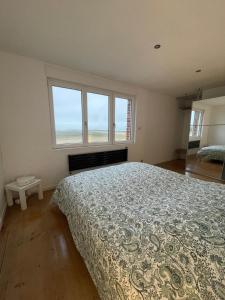 Postel nebo postele na pokoji v ubytování Maison vue mer